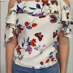 white flowery blouse